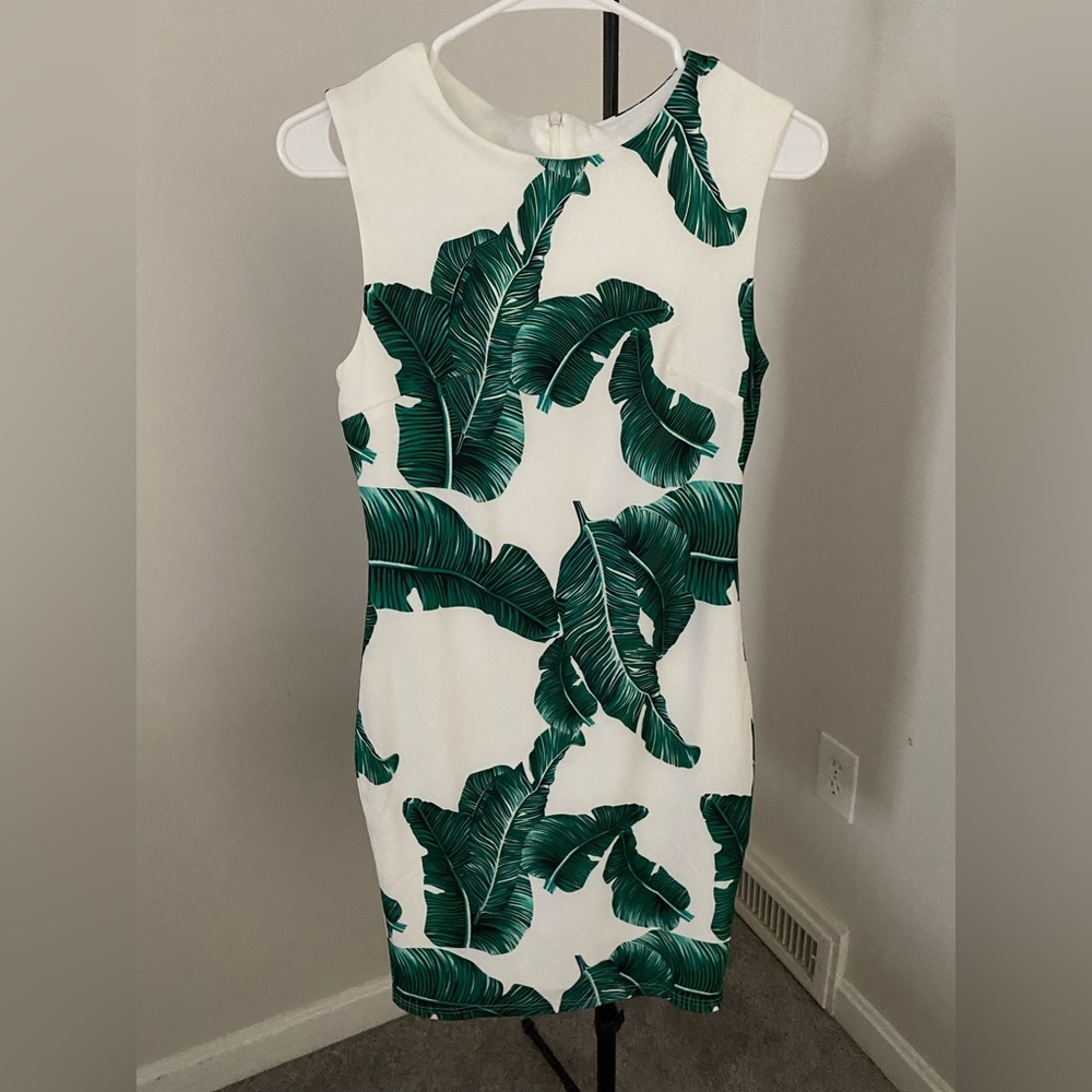 Hawaiian/luau themed dress. Double lined - not see through.